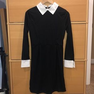 Black dress with a white collar
